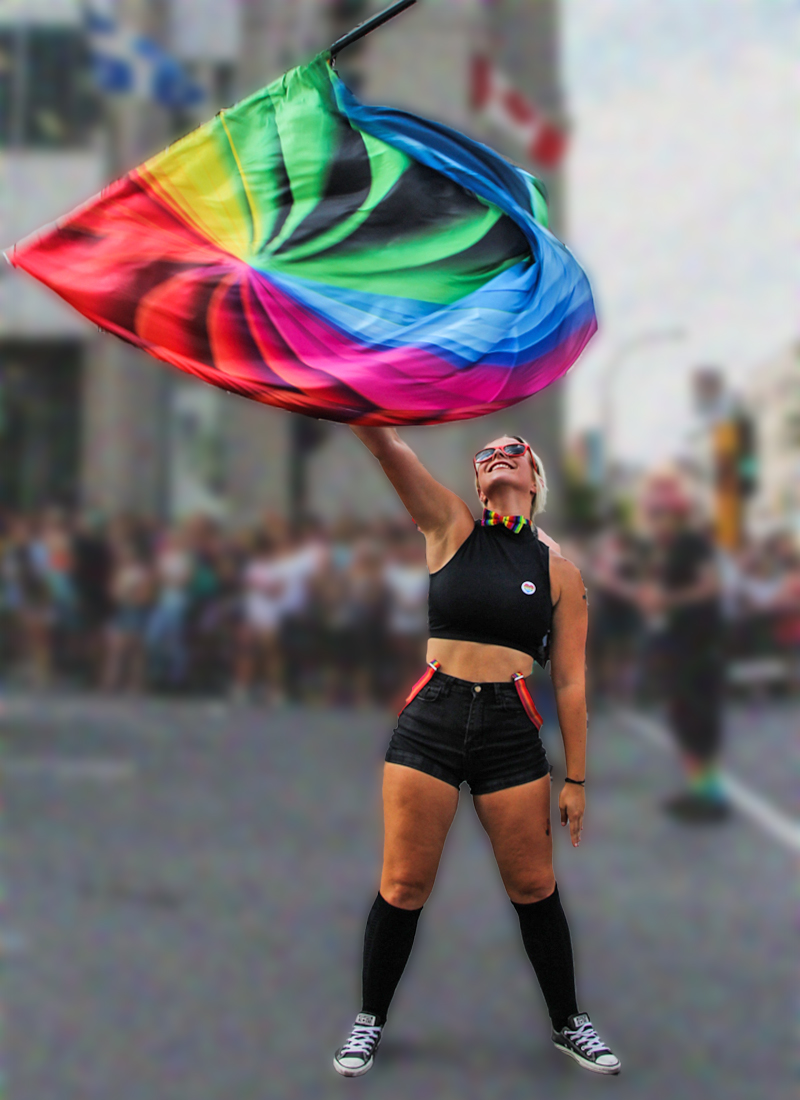 SOTA member tossing her flag in the Montreal parade.